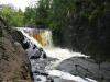 The main drop, hiding behind a rocky bump