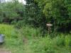 Small sign at the start of the footpath